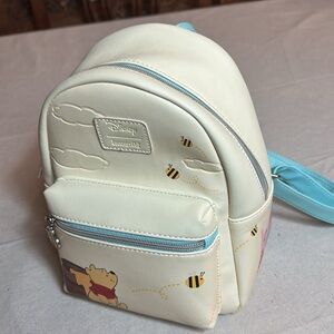 Disney Cream and Blue Mini Backpack with Winnie the Pooh Design